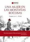 UNA MUJER EN LAS MONTAÑAS ROCOSAS
