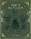 GATOS EN LA CABEZA